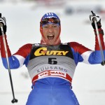 Russia's Legkov reacts after winning the men's 15km freestyle cross country of the FIS World Cup in Ruka, Kuusamo